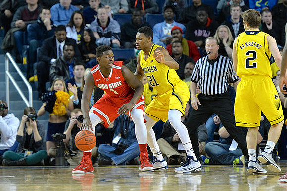 Zak Irvin (21) and Spike Albrecht (2)