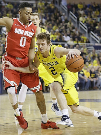 Mark Donnal (34) and Spike Albrecht (2)