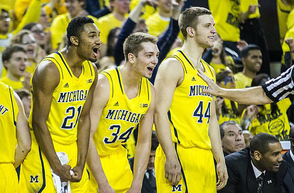Zak Irvin (21), Mark Donnal (34), and Max Bielfeldt (44)