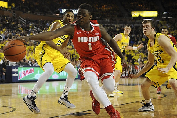 Zak Irvin (21), Ricky Doyle (32), and Spike Albrecht (2)