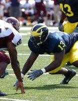 Larry Stevens (13) and Carl Diggs (43)