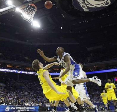Zack Novak (0) and Tim Hardaway Jr. (10)