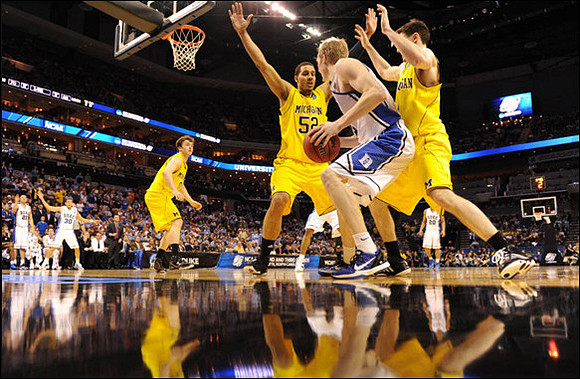 Zack Novak (0), Jordan Morgan (52), and Stu Douglass (1)