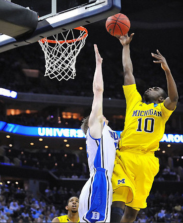 Tim Hardaway Jr. (10) and Darius Morris (4)