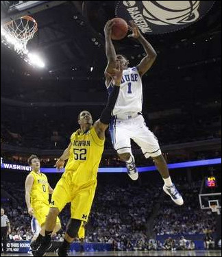 Jordan Morgan (52) and Zack Novak (0)