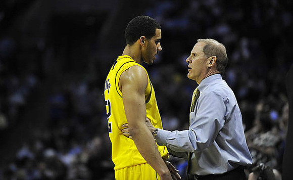 Jordan Morgan (52) and John Beilein