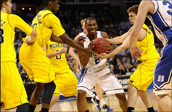 Evan Smotrycz (23), Tim Hardaway Jr. (10), Zack Novak (0), and Stu Douglass (1)