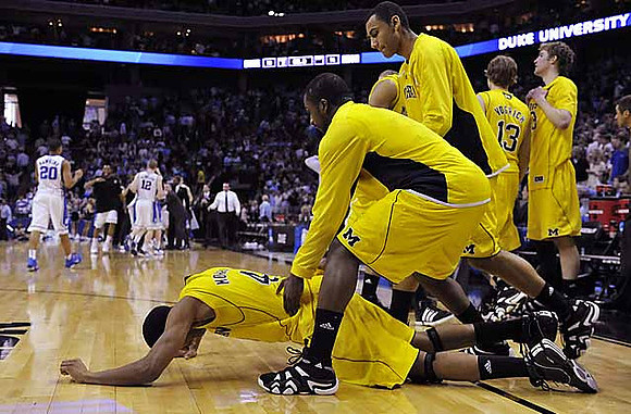 Darius Morris (4), Corey Person (32), Jon Horford (15), Matt Vogrich (13), and Evan Smotrycz (23)
