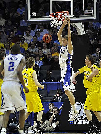 Matt Vogrich (13) and Evan Smotrycz (23)