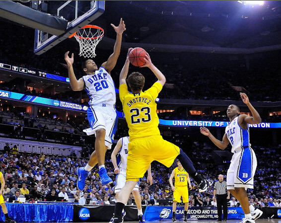 Evan Smotrycz (23) and Matt Vogrich (13)
