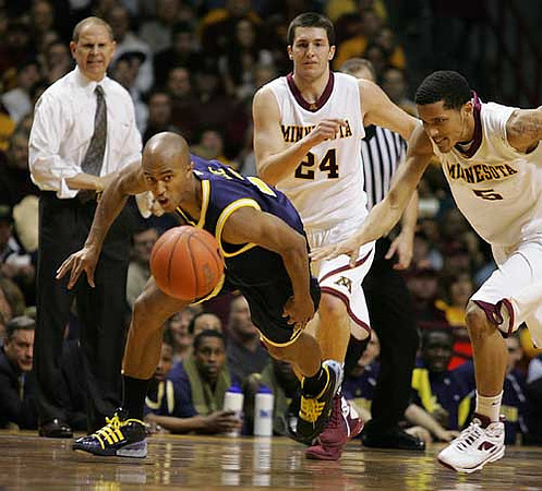 C.J. Lee (2) and John Beilein