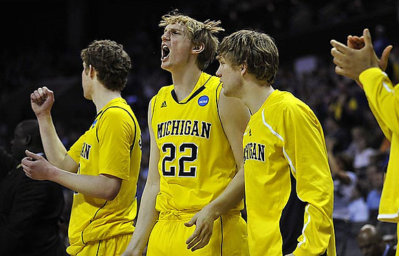 Evan Smotrycz (23), Blake McLimans (22), and Matt Vogrich (13)
