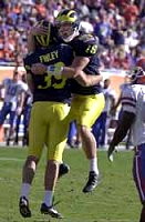 Adam Finley (39) and John Navarre (16)