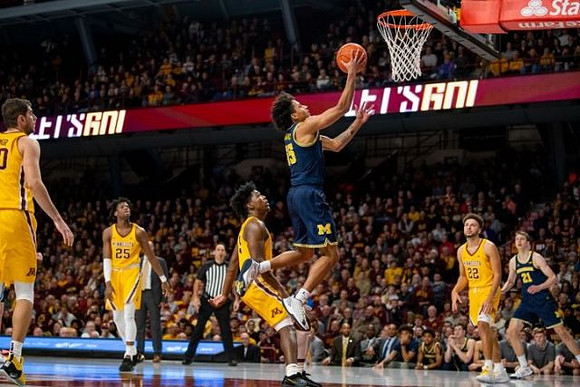 Eli Brooks (55) and Franz Wagner (21)