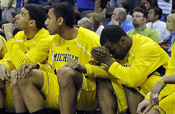 Colton Christian (45), Jon Horford (15), and Eso Akunne (5)