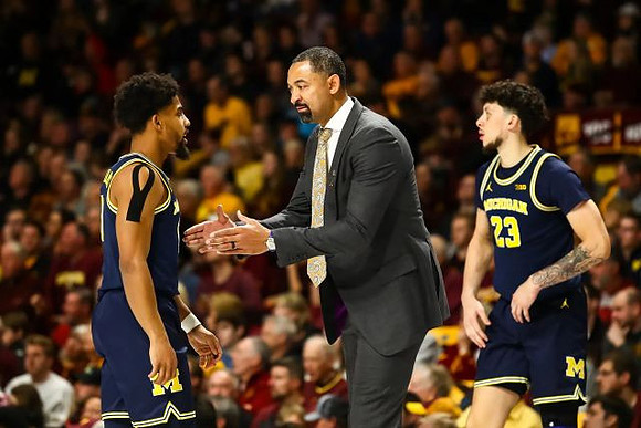 David DeJulius (0), Juwan Howard, and Brandon Johns Jr. (23)
