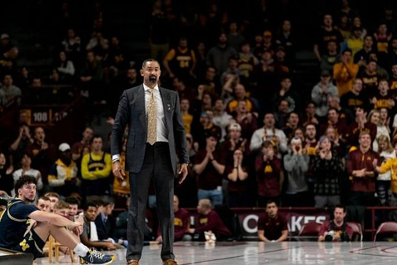 Brandon Johns Jr. (23) and Juwan Howard