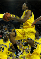 Darius Morris (4), DeShawn Sims (34), and Manny Harris (3)