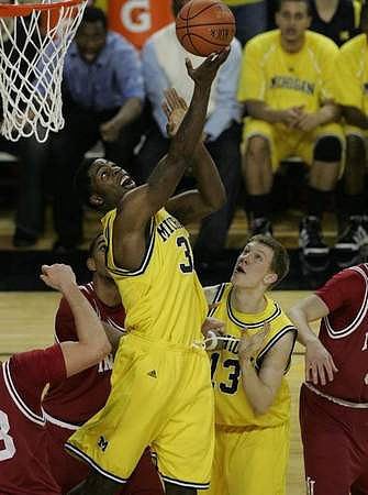 Manny Harris (3) and Matt Vogrich (13)