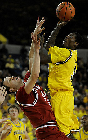Manny Harris (3) and Zack Novak (0)