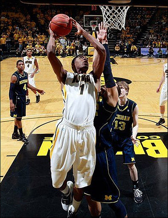 Darius Morris (4), Jordan Morgan (52), and Matt Vogrich (13)