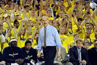 Anthony Wright (12), Darius Morris (4), and John Beilein