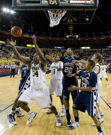 DeShawn Sims (34), Manny Harris (3), Zack Novak (0), and Laval Lucas-Perry (31)