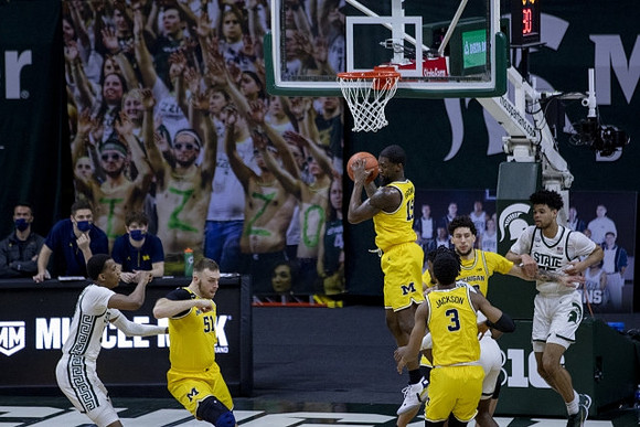 Austin Davis (51), Chaundee Brown Jr. (15), Adrien Nunez (0), and Brandon Johns Jr. (23)