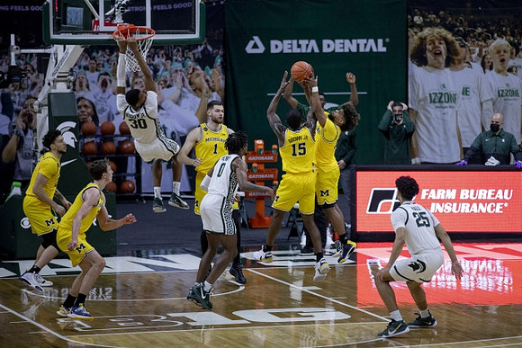 Brandon Johns Jr. (23), Franz Wagner (21), Hunter Dickinson (1), Chaundee Brown Jr. (15), and Mike Smith (12)