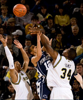 Darius Morris (4) and DeShawn Sims (34)