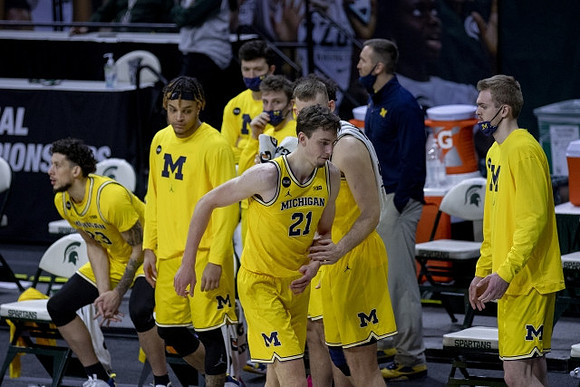 Franz Wagner (21) and Michigan Team