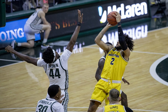 Isaiah Livers (2) and Austin Davis (51)