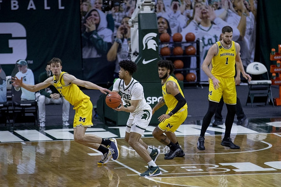Franz Wagner (21), Isaiah Livers (2), and Hunter Dickinson (1)