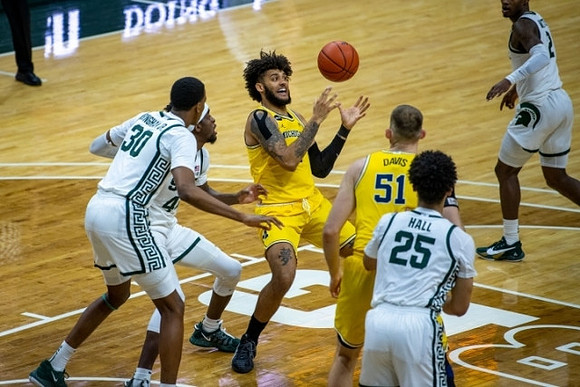 Isaiah Livers (2) and Austin Davis (51)
