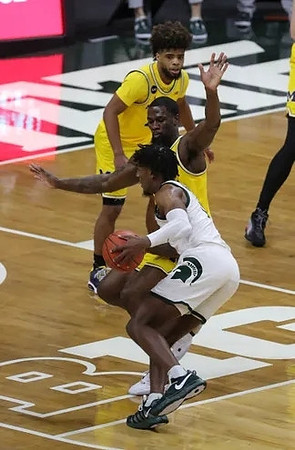 Mike Smith (12) and Chaundee Brown Jr. (15)