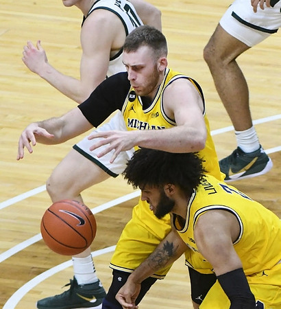 Austin Davis (51) and Isaiah Livers (2)