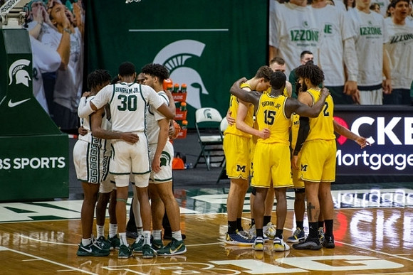 Franz Wagner (21), Chaundee Brown Jr. (15), Austin Davis (51), Mike Smith (12), and Isaiah Livers (2)