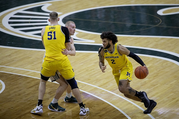 Austin Davis (51) and Isaiah Livers (2)