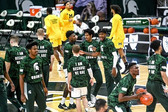 Chaundee Brown Jr. (15), Terrance Williams II (5), and Isaiah Livers (2)