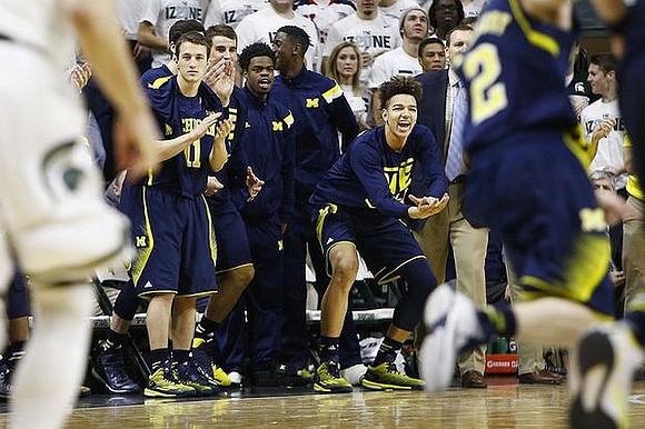 Spike Albrecht (2), Andrew Dakich (11), Austin Hatch (30), Derrick Walton Jr. (10), Caris LeVert (23), and D.J. Wilson (5)