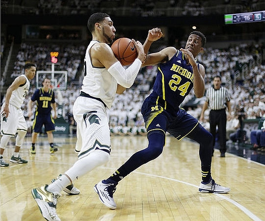 Andrew Dakich (11) and Aubrey Dawkins (24)