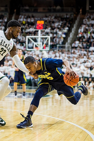 Spike Albrecht (2) and Muhammad-Ali Abdur-Rahkman (12)