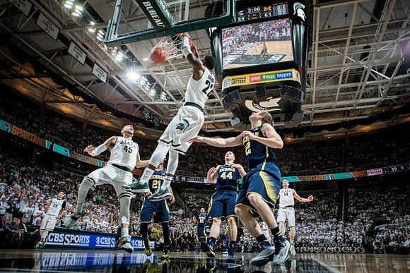 Zak Irvin (21), Max Bielfeldt (44), and Spike Albrecht (2)