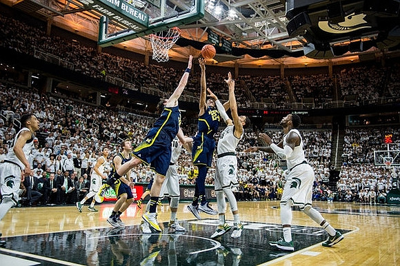 Spike Albrecht (2), Ricky Doyle (32), and Aubrey Dawkins (24)