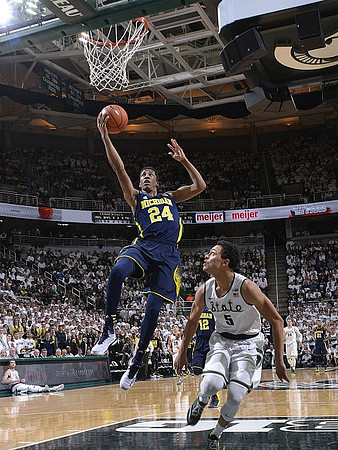 Aubrey Dawkins (24), Muhammad-Ali Abdur-Rahkman (12), and Zak Irvin (21)