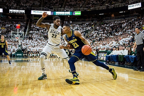 Spike Albrecht (2) and Zak Irvin (21)