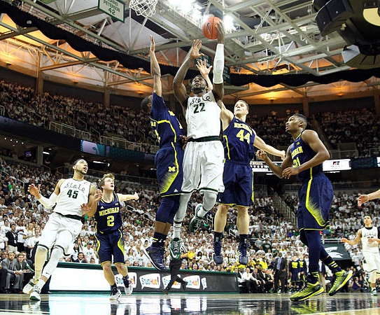 Spike Albrecht (2), Muhammad-Ali Abdur-Rahkman (12), Max Bielfeldt (44), and Zak Irvin (21)