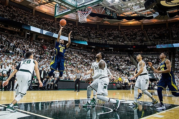 Muhammad-Ali Abdur-Rahkman (12) and Aubrey Dawkins (24)