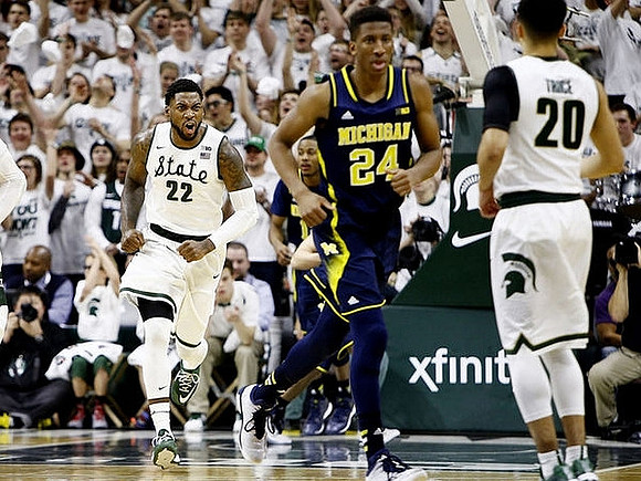 Muhammad-Ali Abdur-Rahkman (12) and Aubrey Dawkins (24)