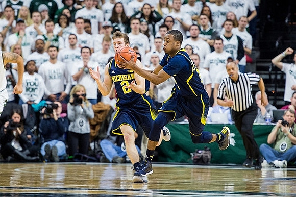 Spike Albrecht (2) and Muhammad-Ali Abdur-Rahkman (12)